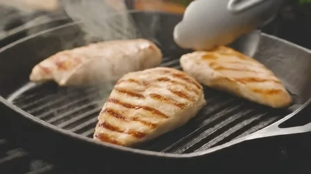 chicken-breast-being-grilled-on-a-pan